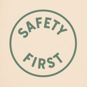Vintage round sign saying Safety First, symbolizing awareness in the swinger lifestyle