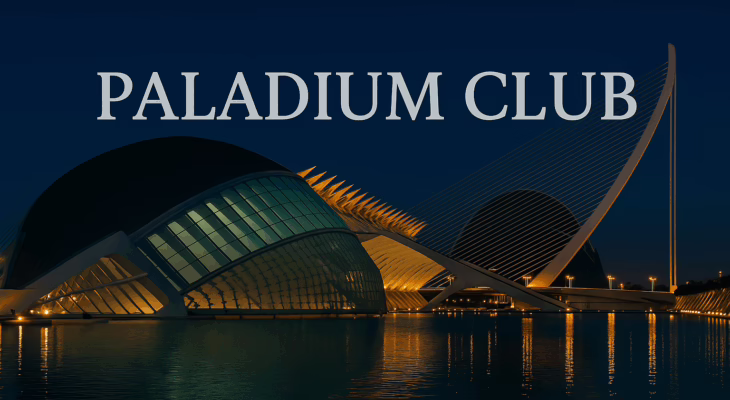 Nighttime view of Valencia’s City of Arts and Sciences with bold Paladium Club text overlay, reflecting in the water with elegant architectural lighting