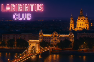 Illuminated nighttime view of Budapest with the Chain Bridge and St. Stephen’s Basilica glowing over the Danube, featuring the text “Labirintus Club” — representing the vibrant and discreet atmosphere of the newly opened Labirintus Swinger Club in the city.