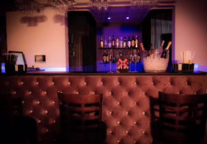 Elegant bar and lounge area inside Bad Romance Bucharest swinger club