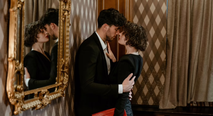 Elegant couple sharing an intimate moment, symbolizing trust, desire, and emotional connection in wife sharing relationships