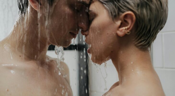 Couple sharing an intimate moment under a shower, symbolizing trust, consent, and emotional closeness in wife sharing in practice