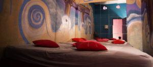 Large themed play room inside ATLANTIS Rivesaltes featuring cushions and atmospheric décor