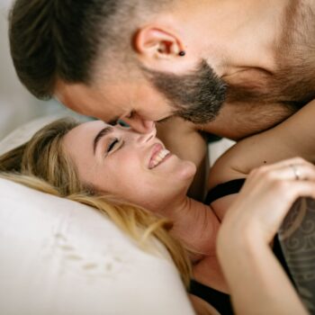 Happy couple sharing an intimate moment while exploring their swinging sex life